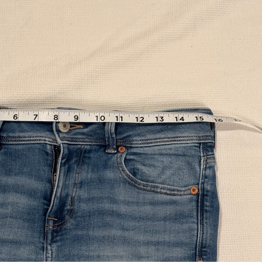 American Eagle Next Level Stretch High Rise Kick Boot Jeans in Light Wash Denim - Picture 8 of 12